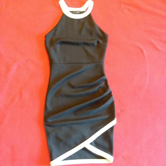 The Vintage Shop Dresses & Skirts - The vintage shop Body enhancing black dress